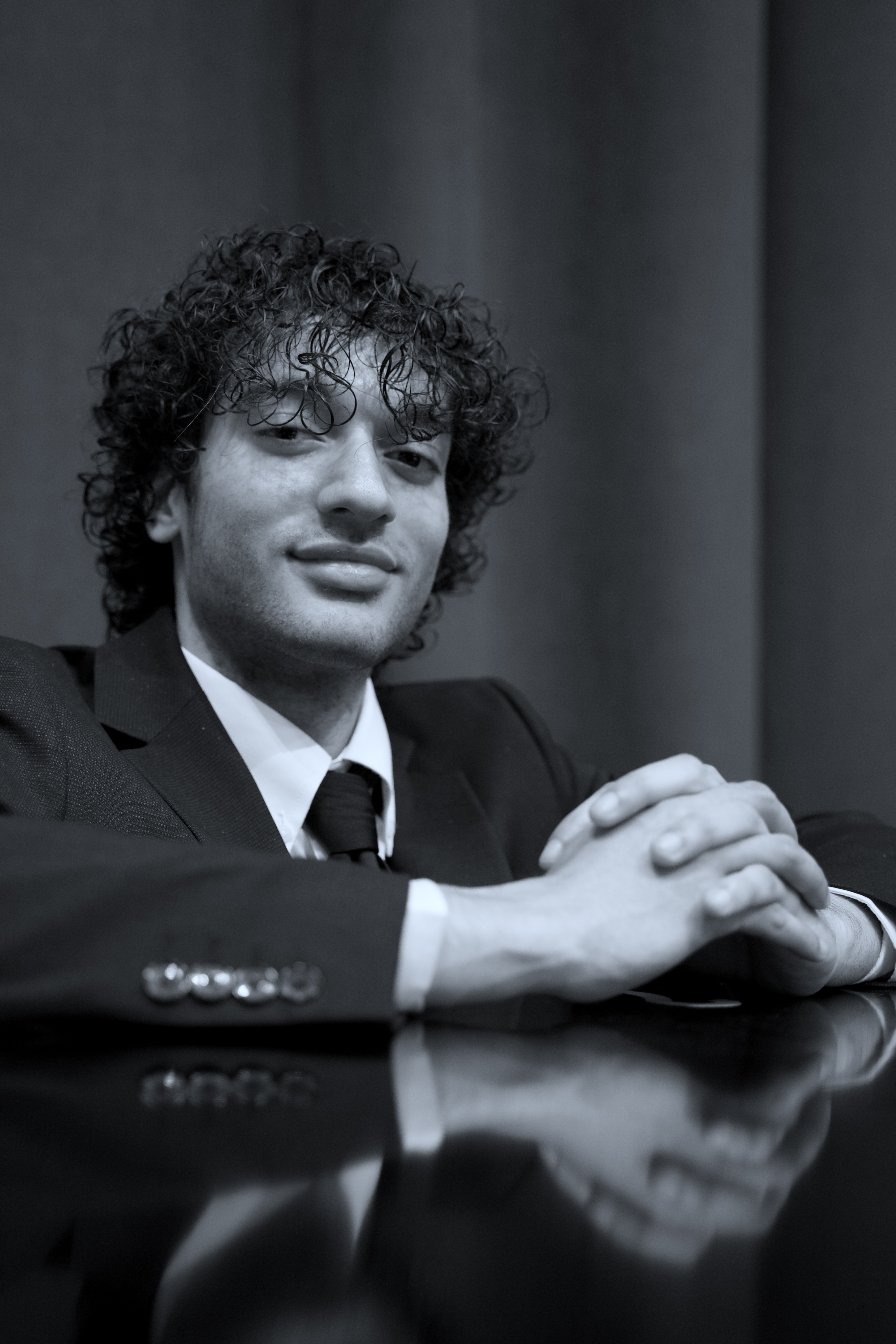 Black and white portrait of Oliver Rivera at the piano
